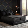 The Beautyrest Black hybrid mattress in a bedroom on a black bed||series: exceptional kx-class||feel: firm
