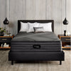 The Beautyrest Black hybrid mattress in a bedroom on a black bed||series: enhanced lx-class